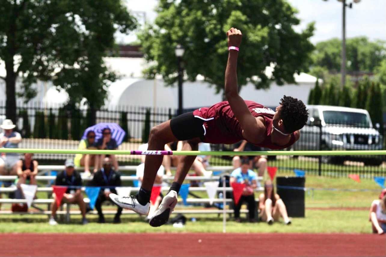 Japheth Richmond jumps to a silver medal with a height of 6'4."